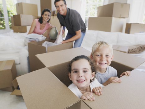 Moving team handling items safely during a Woolwich van service