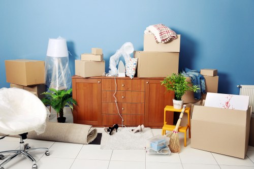 Removal team planning a house move in Woolwich near local residential streets