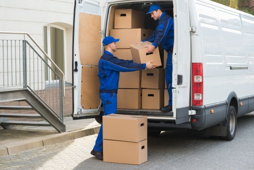 Local business move setup with labeled boxes and furniture