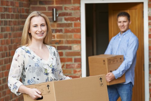 Packed boxes and furniture prepared for removal truck hire