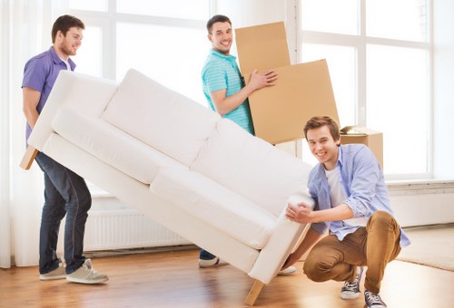 Commercial removals team handling office equipment in Woolwich