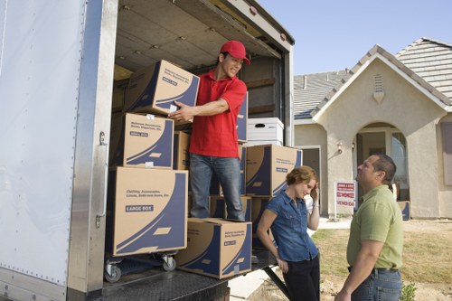 Van loading scene with careful item handling