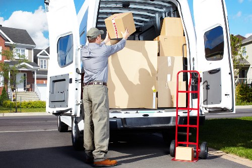 Unpacking boxes in a Woolwich home after a move