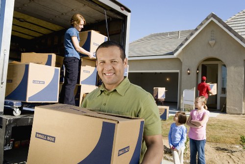 Household furniture and boxes prepared for a Woolwich moving service